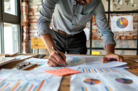 Person preparing a business presentation, practicing in front of a mirror
